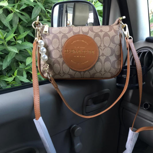 Coach Signature Crossbody Bag with Pearl Charm